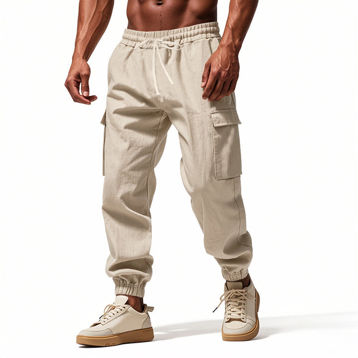 Herrer nan konisk skrånende joggere i utilitarisk stil med elastisk talje, snøre og klaplommer Skovae