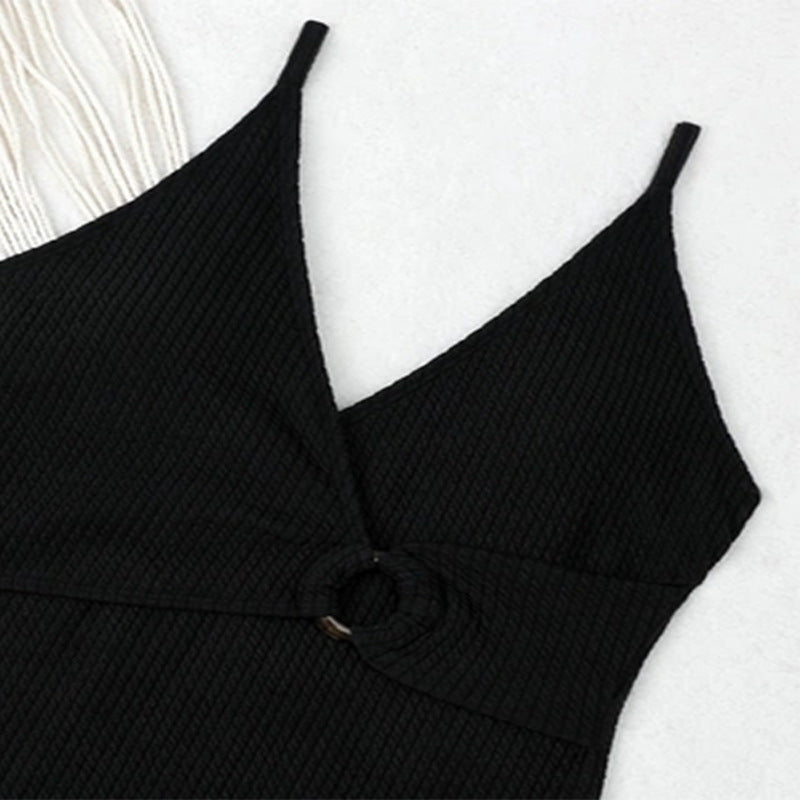 Dame én-delt badedragt med elegant indpakningslook og moderigtigt ringdetalje Stilla