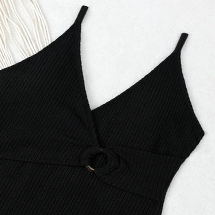 Dame én-delt badedragt med elegant indpakningslook og moderigtigt ringdetalje Stilla