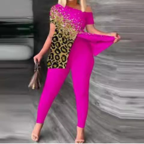 Dame figursyet jumpsuit med off-shoulder design og glamourøse accenter Skovae