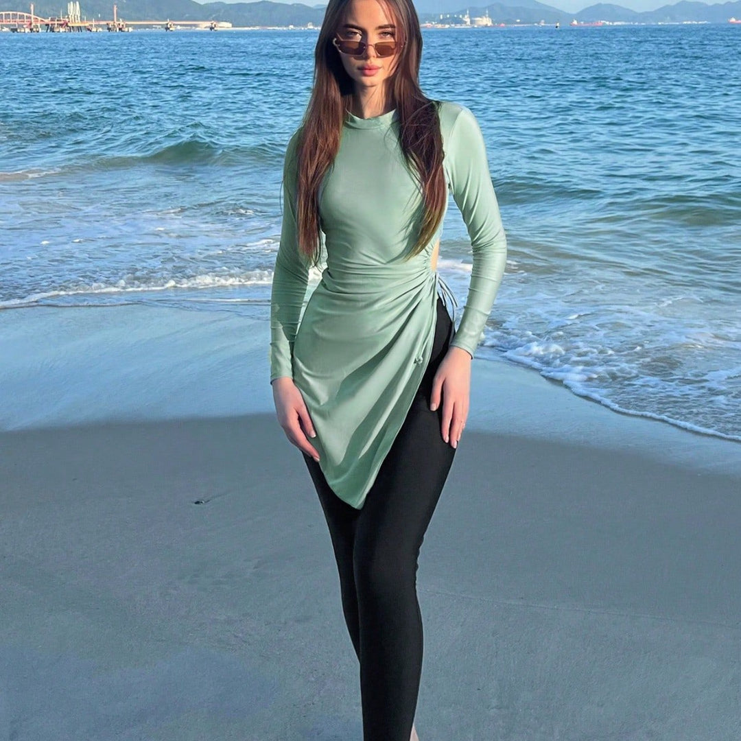 Dame moderigtigt strandoutfit med længere top Skovae