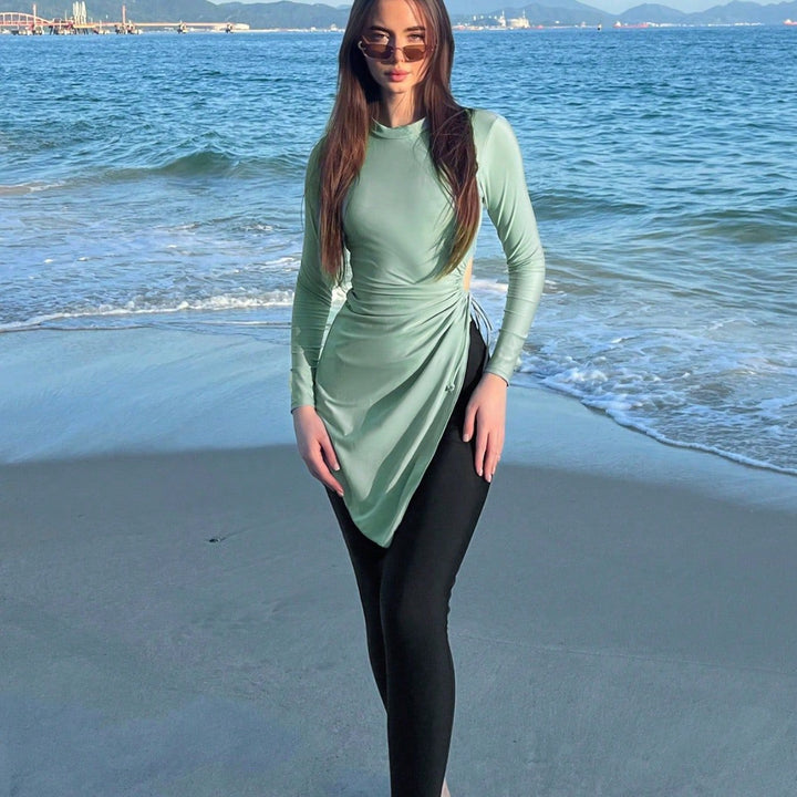 Dame moderigtigt strandoutfit med længere top Skovae