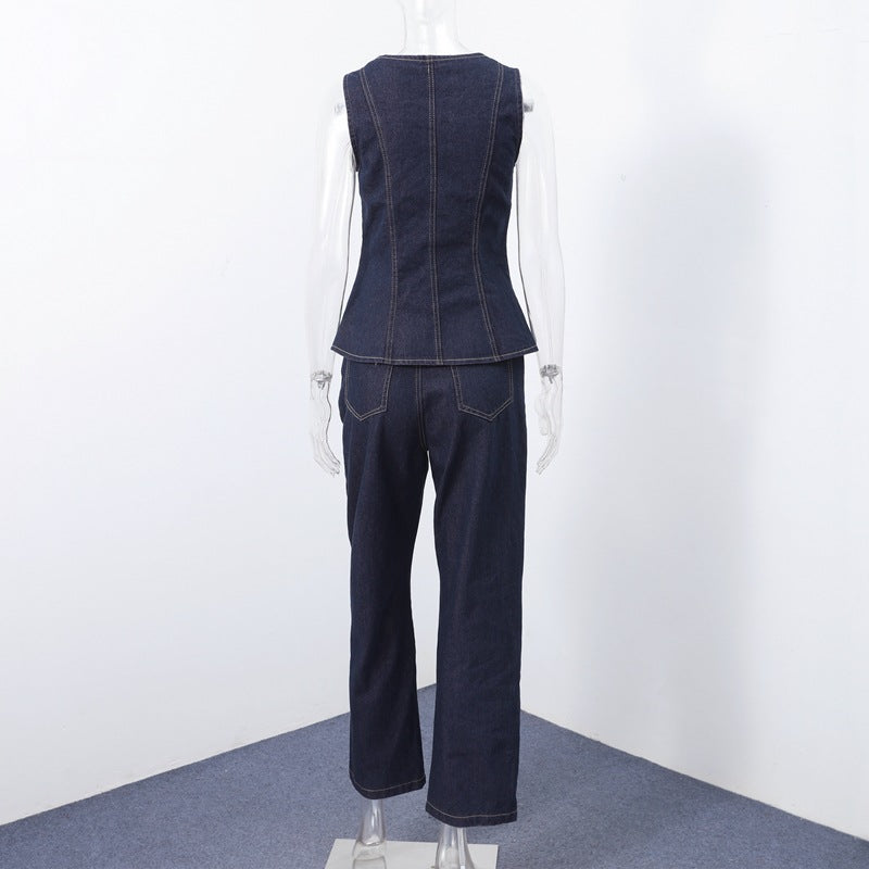 Dame Jeans-Overall med taljeret silhuet og elegante knapdetaljer