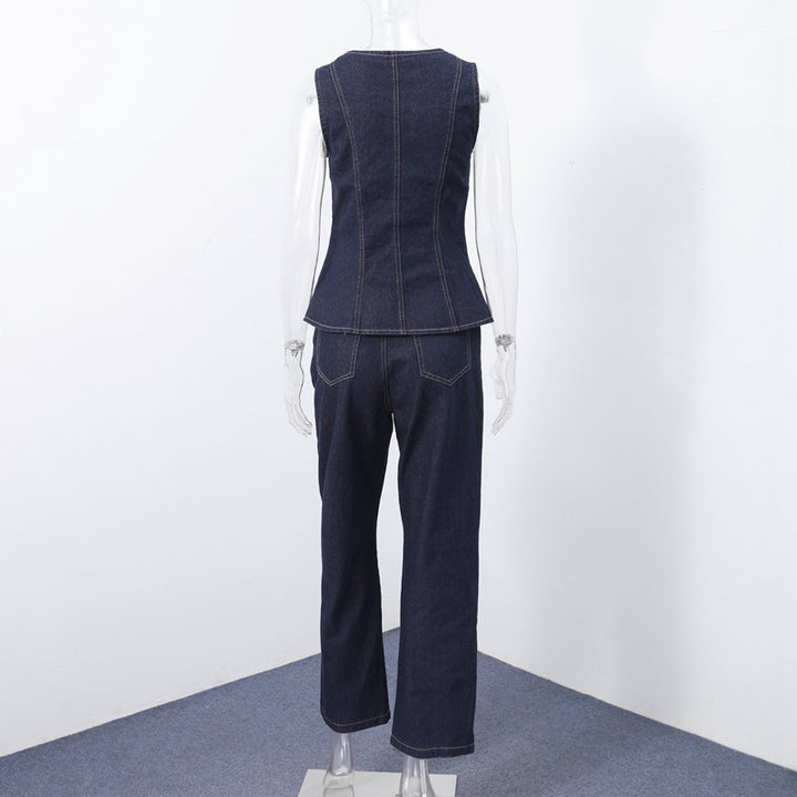 Dame Jeans-Overall med taljeret silhuet og elegante knapdetaljer