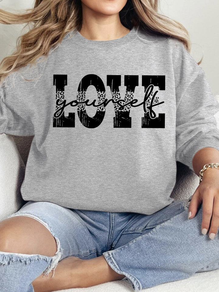 Kvinders sweatshirt med kreativ LOVE påskrift og afslappet pasform Stilla