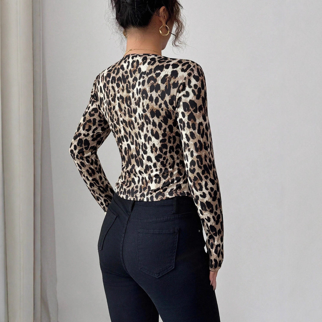 Dame nan skræddersyet kort blazer af stretchjersey med leopardstruktur og smal pasform Skovae