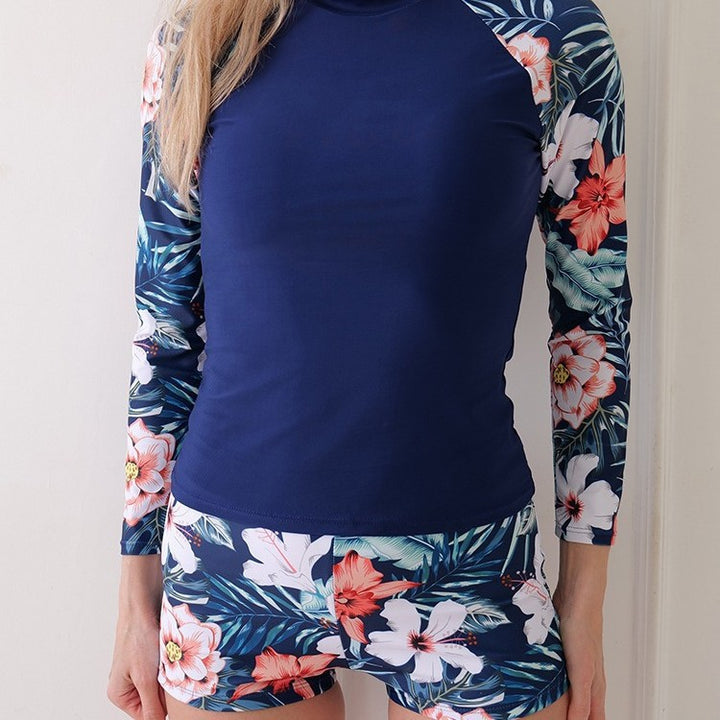 Dame Langærmet Badetop med blomsterdesign og sportslig snit Stilla