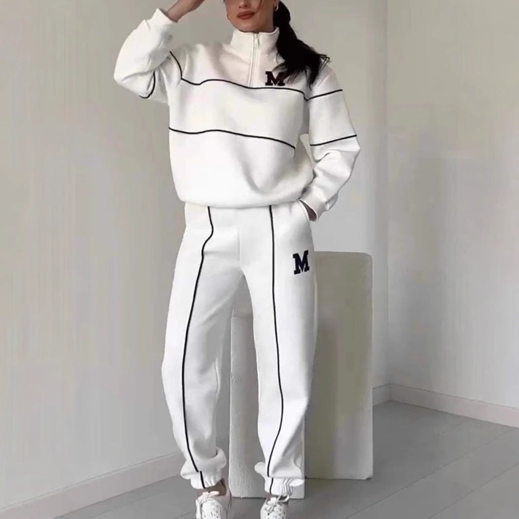 Kvinders sporty loungewear-sæt med halv lynlås og elastisk talje Stilla