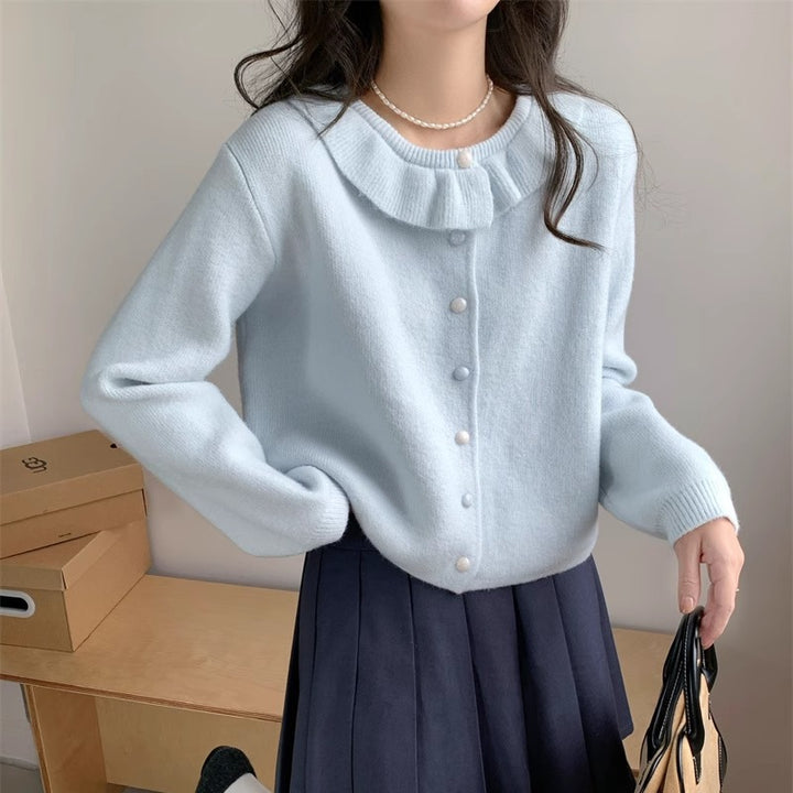 Kvinders strikket sweater med romantisk flæsekrave og fine knapdetaljer Stilla