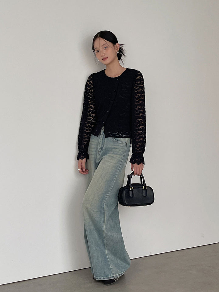 Dame elegant spidsbluse med knapdetaljer og lange ærmer Stilla