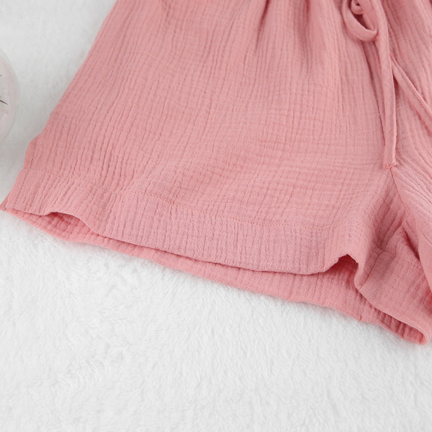 Dame luftig Kortærmet pyjamasæt i let materiale med knaplukning og elastisk talje Stilla