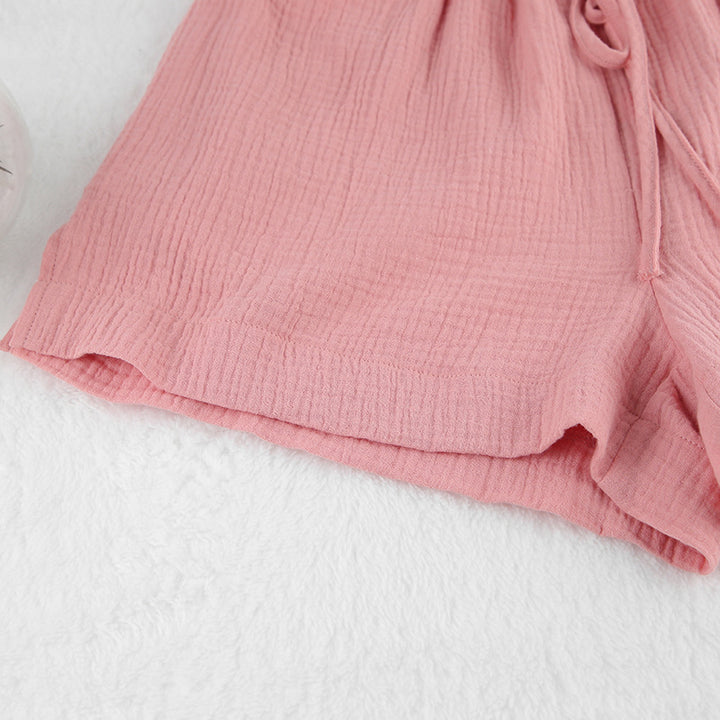 Dame luftig Kortærmet pyjamasæt i let materiale med knaplukning og elastisk talje Stilla