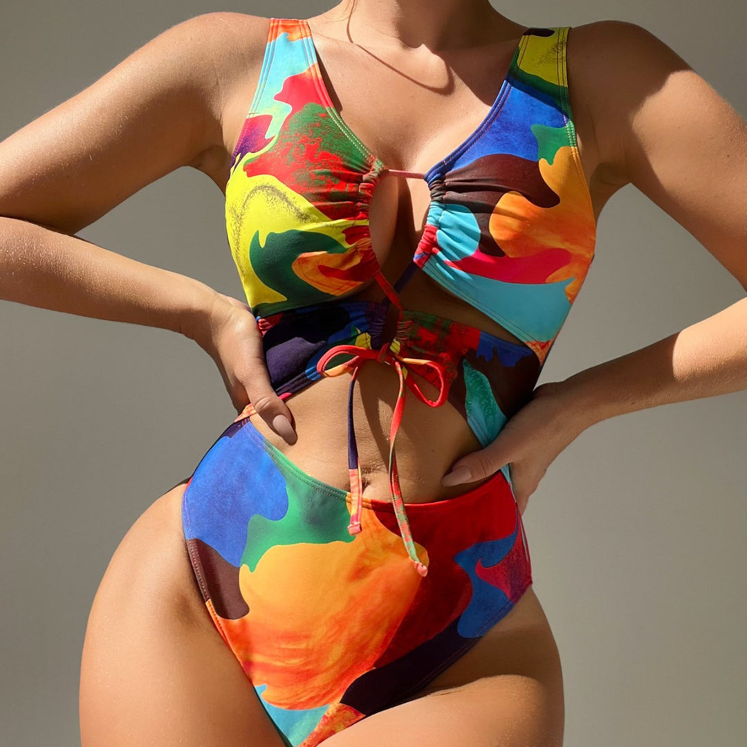 Dame heldragt badedragt med farverigt cut-out-design Skovae