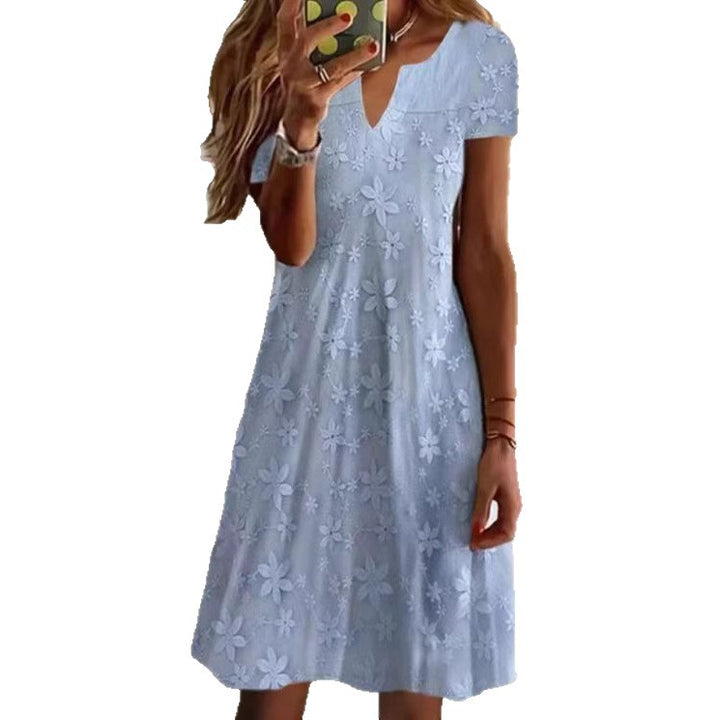 Damer knælang A-linje dress i bomuldsblanding med broderet overlay, korte ærmer og V-udskæring Skovae