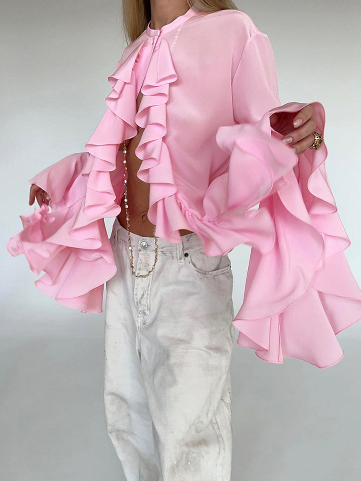 Damebluse med voluminøse flæser og elegante trompetærmer Stilla