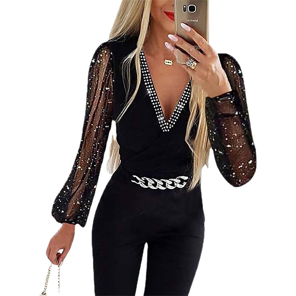 Dame elegant jumpsuit med gennemsigtige ærmer Stilla