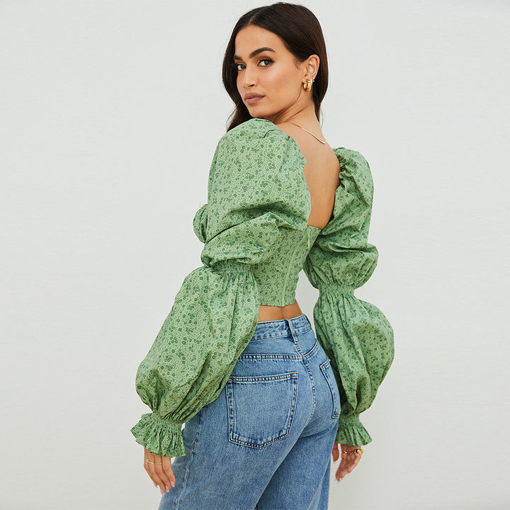 Damebluse med puffede ærmer og blomsterdesign Stilla