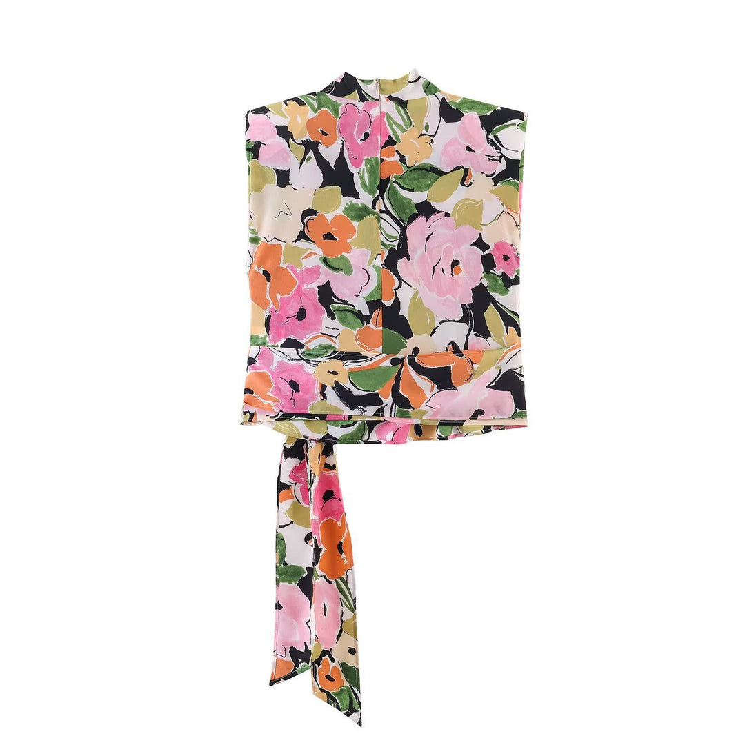 Damebluse med blomstermotiv og elegant knytning Skovae