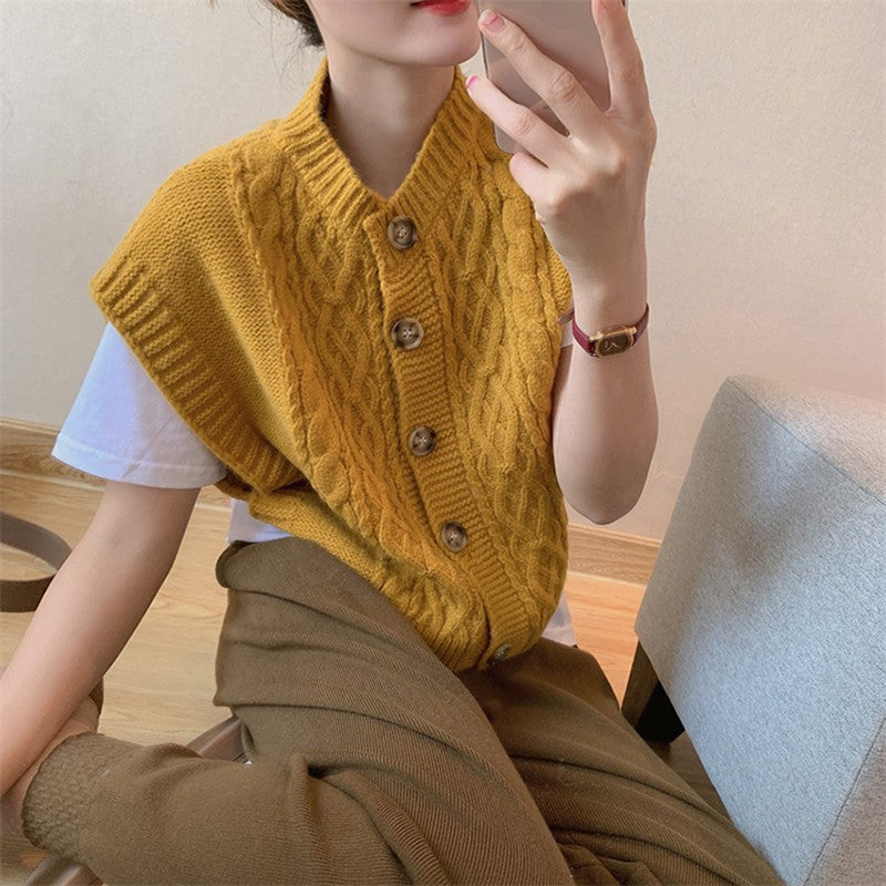 Kvinders strikkede sweater med knapstolpe og kabelmønster Stilla
