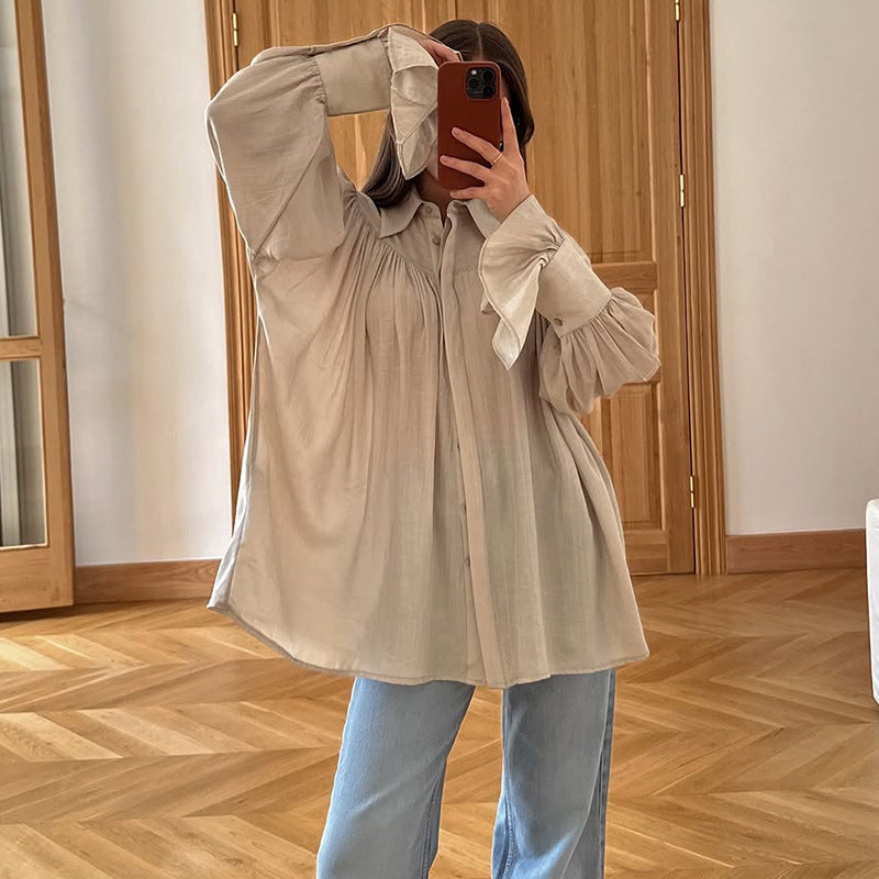 Dame oversized bluse med voluminøse ærmer og elegant knaplukning Stilla