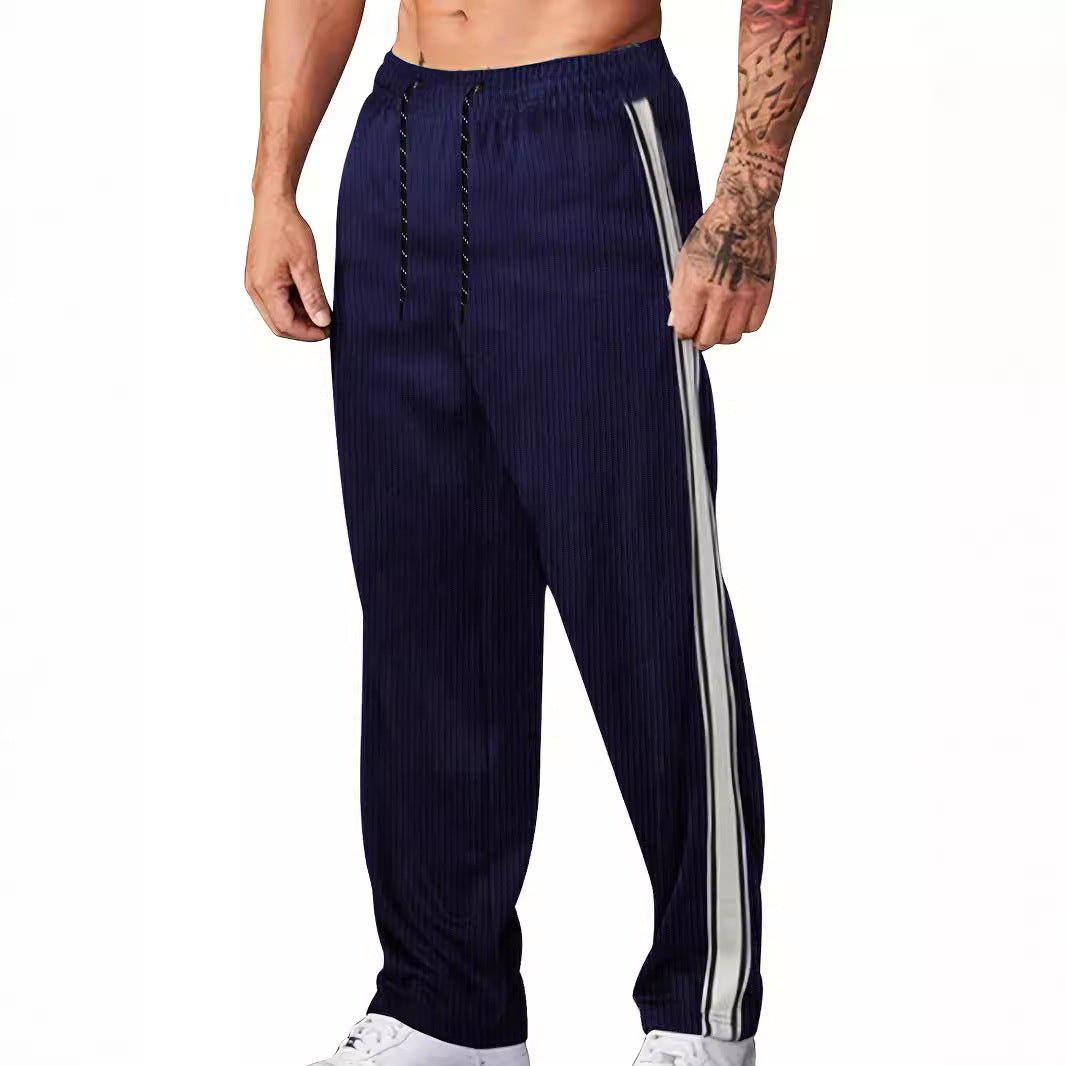 Herren nan ribbet Relax-Joggingbukser med bred ben, siden piping og elastisk snørebånd Skovae