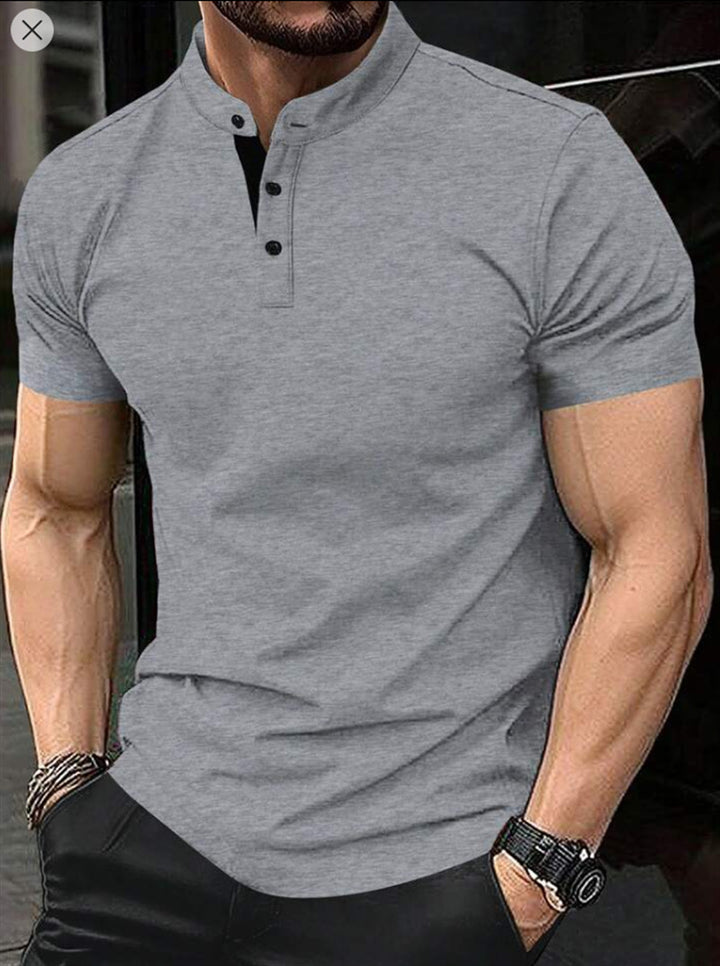 Herren poloshirt med moderne ståkrave og kontrasterende knapper Stilla