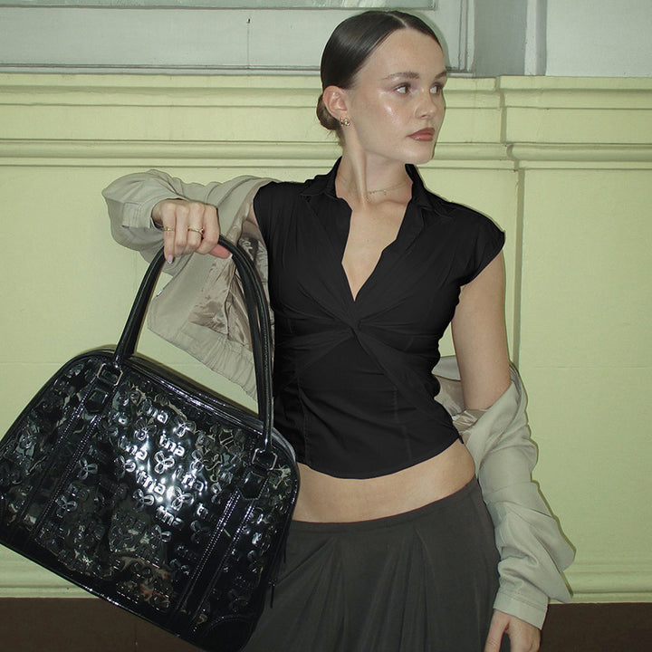 Dame elegant kortærmet bluse med knudeformet design Skovae