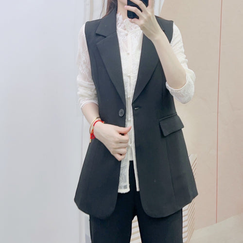 Dame elegant vest med dobbelt knapliste og struktureret design Stilla