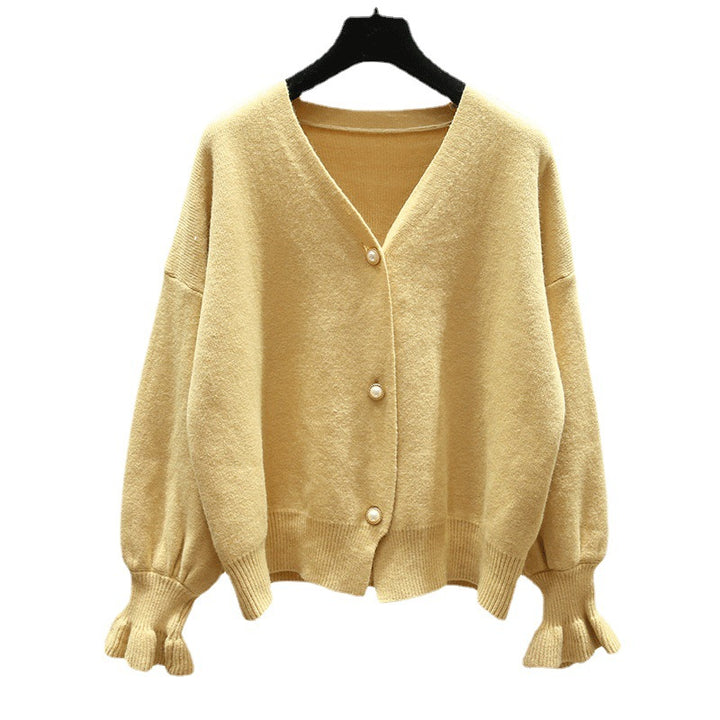 Kvinders cardigan med elegante perleknapper Stilla