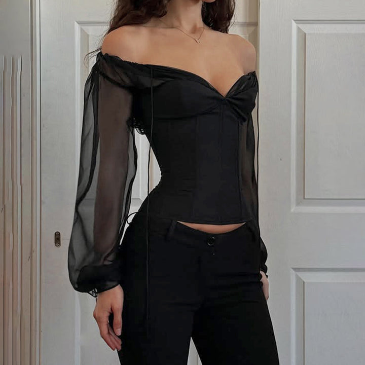 Dame elegant top med transparente ærmer og smal silhuet Skovae