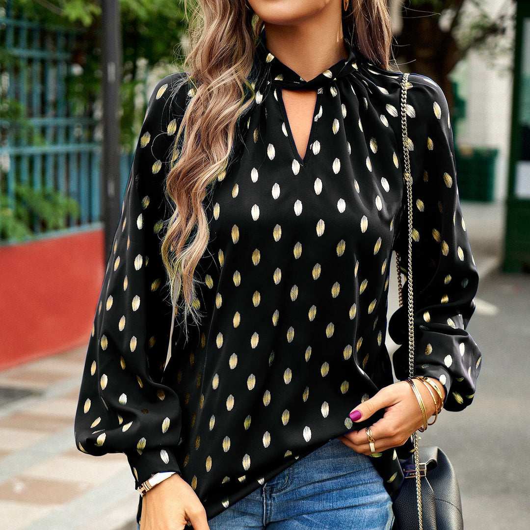 Dame elegant bluse med gyldne prikker og moderne puffærmer Stilla