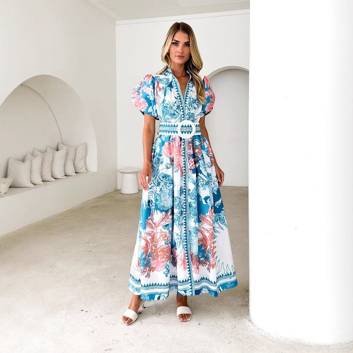 Dame Maxikjole med legende blomsterdesign og elegante pufærmer Stilla
