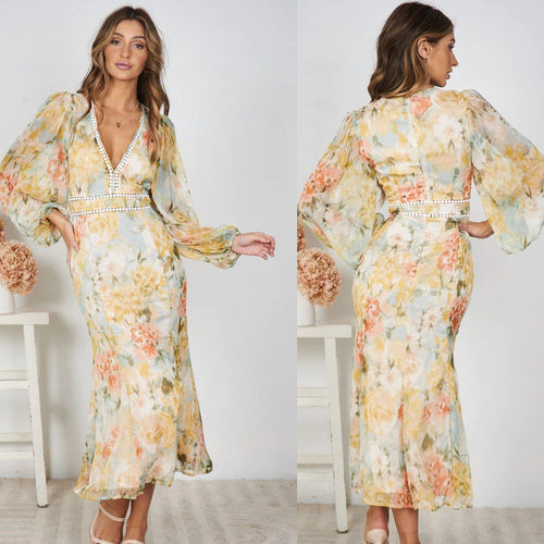 Dame Maxi-kjole med romantisk blomsterprint og elegante flæsedetaljer Stilla