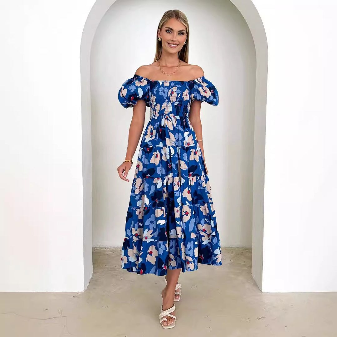 Kvinders maxikjole med off-the-shoulder design og voluminøse puffærmer Stilla