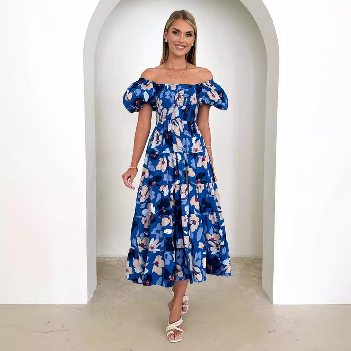 Kvinders maxikjole med off-the-shoulder design og voluminøse puffærmer Stilla