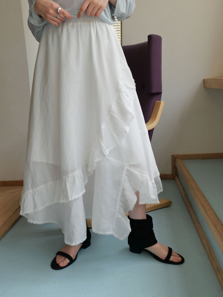 Dame asymmetrisk maxiskørt med fine ruffle-detaljer og elastisk talje Stilla