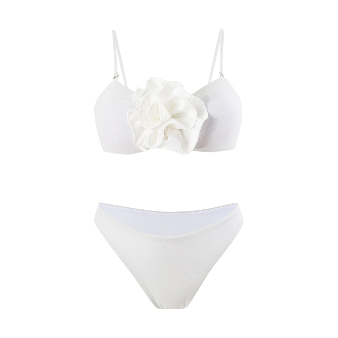 Dame bikiniset med moderigtig indpakningsskørt og floral applikation Stilla
