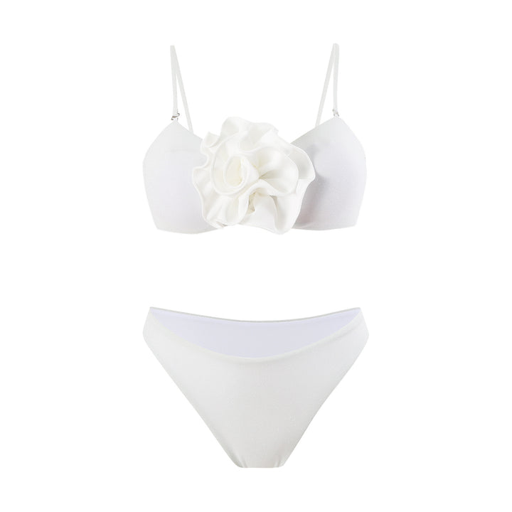 Dame bikiniset med moderigtig indpakningsskørt og floral applikation Stilla