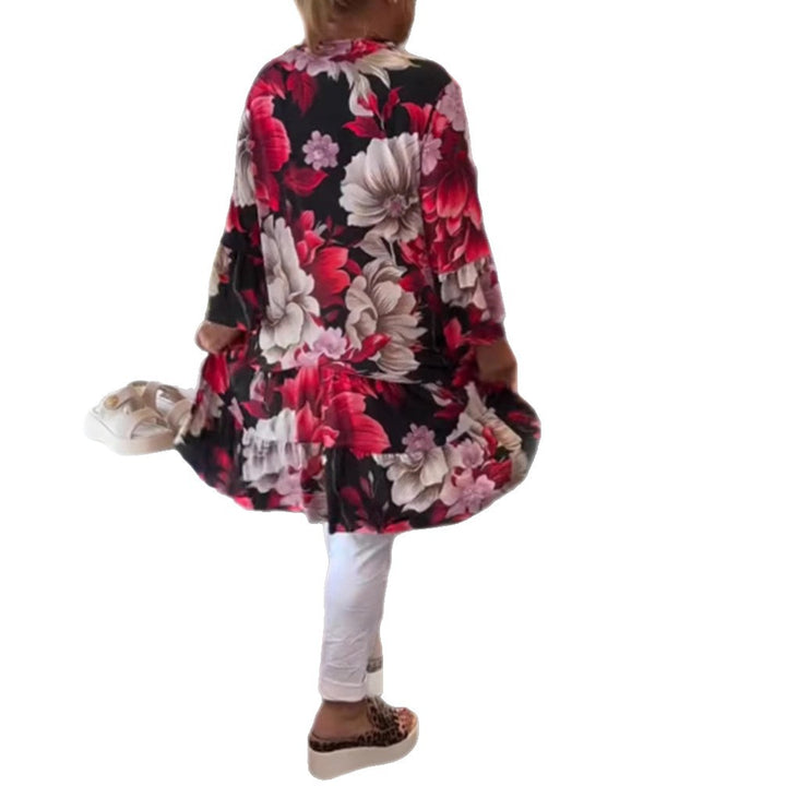 Dame nan svingende tunika-kjole i babydoll-stil med v-hals og stuf volants Skovae