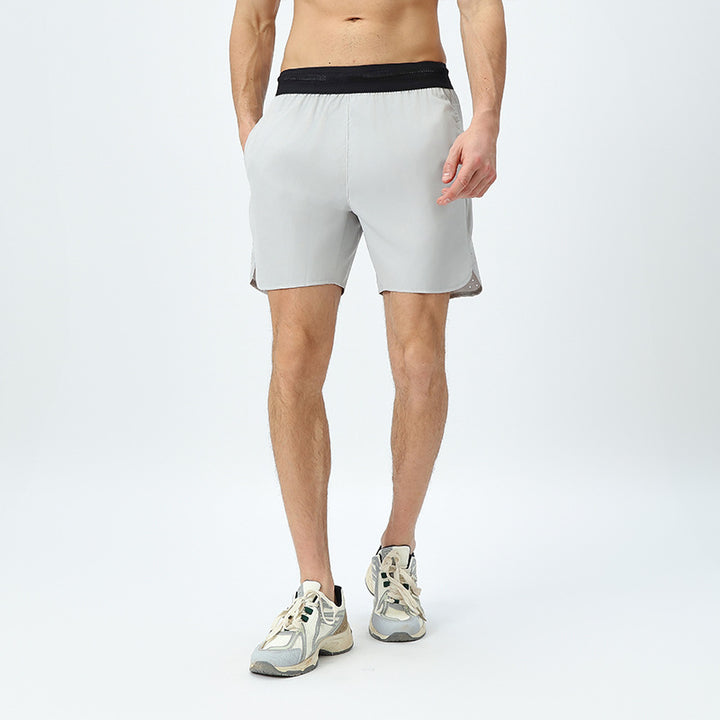 Herre åndbare sportshorts med elastisk linning og hurtigttørrende materiale Stilla