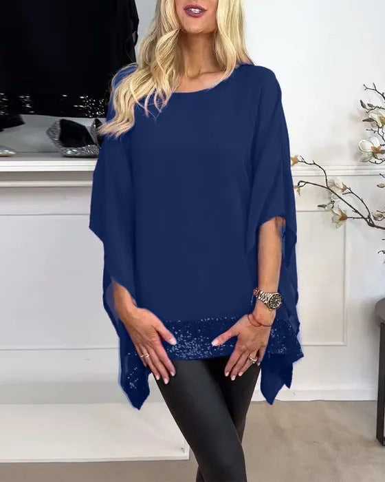 Kvindernes fashionable poncho top med elegant blonderfinish Stilla