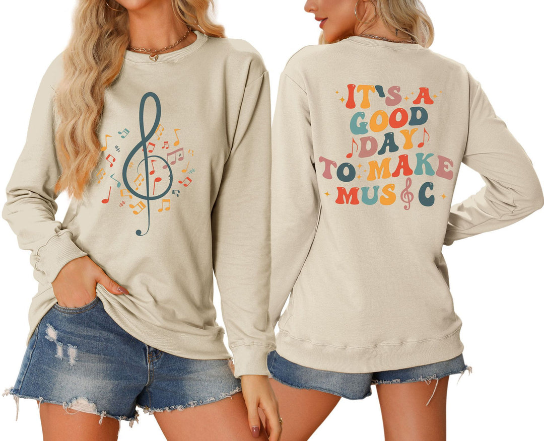 Damer sweatshirt med musikalsk motiv og kreativ tekst Stilla