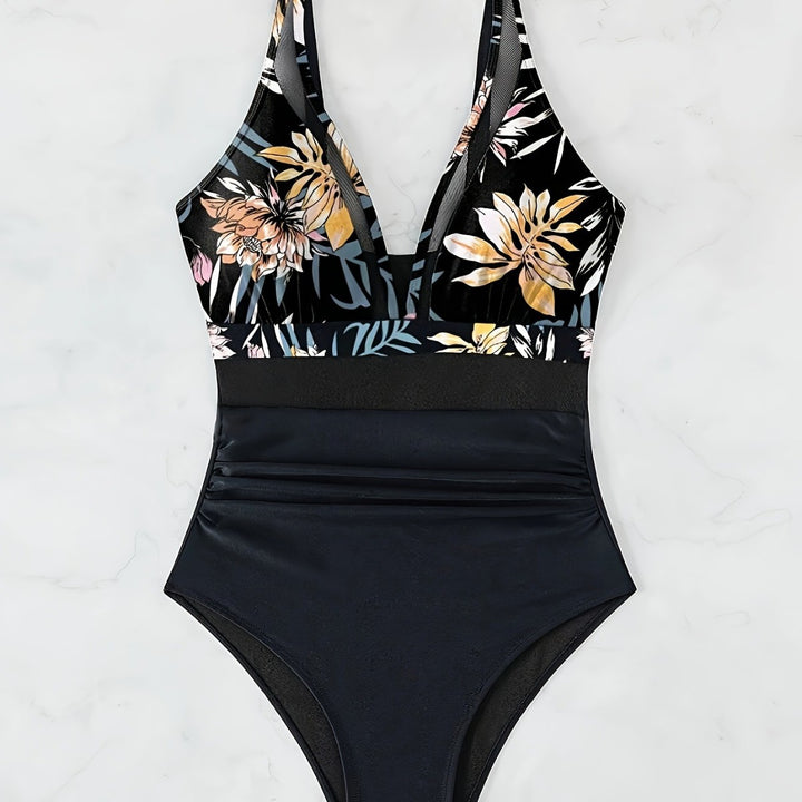 Dame heldragt badetøj med blomstret design og sporty pasform Stilla