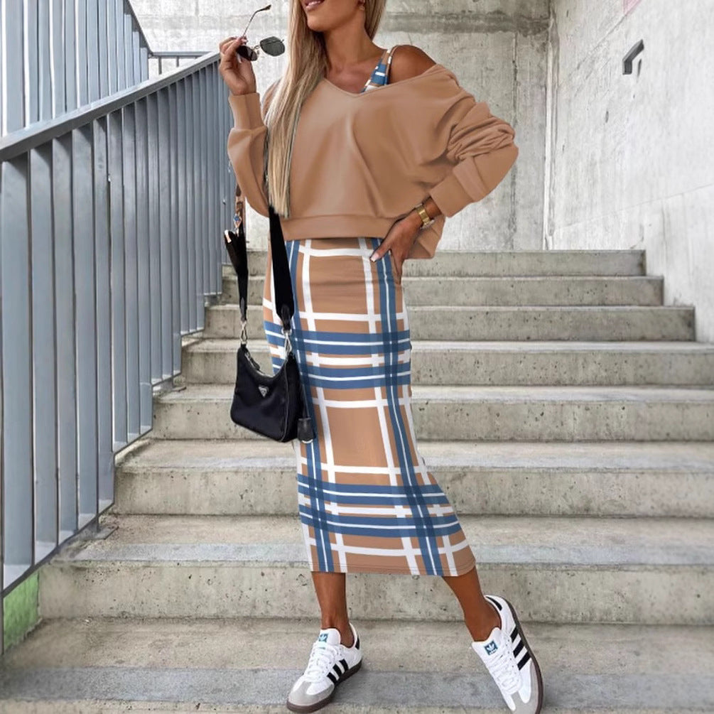 Dame afslappet sweater med asymmetrisk snit og elegant ternet midikjole Stilla