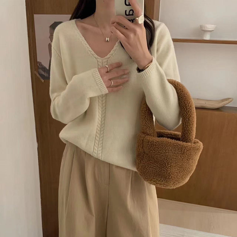 Kvinders oversized V-hals sweater med fint strikket tekstur Stilla