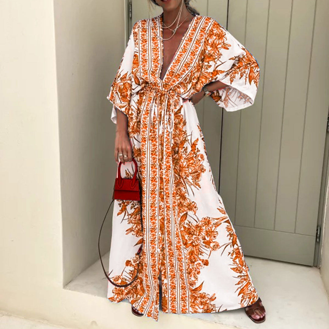 Dame let kaftan med kunstnerisk blomsterdesign og elegante detaljer Stilla