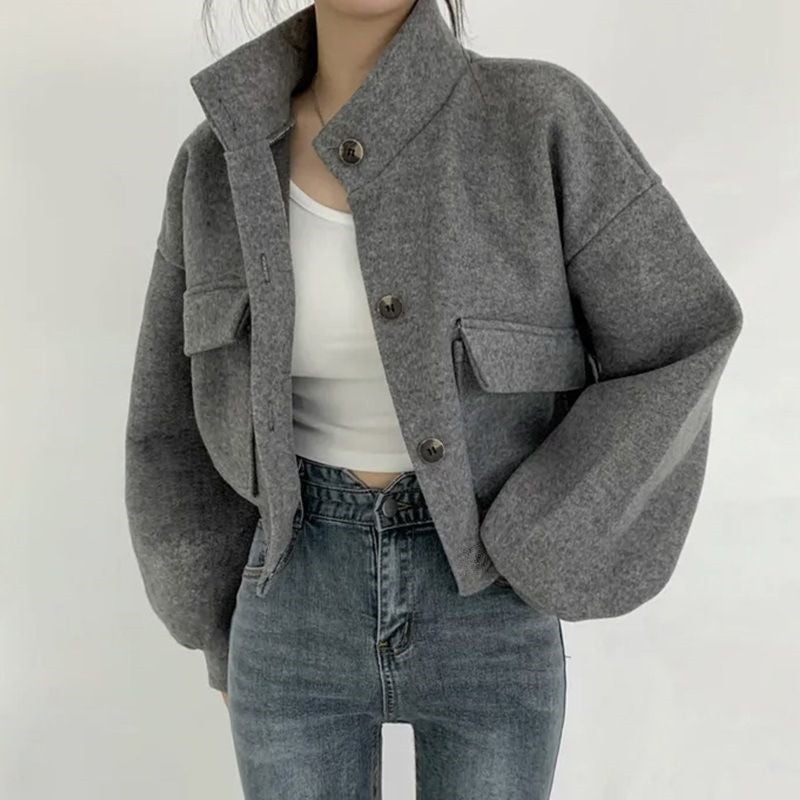 Women's cropped bomber jacket with voluminous sleeves and practical pockets