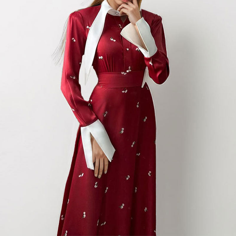 Kvinders elegante maxikjole med kunstnerisk drapering og lange ærmer Stilla