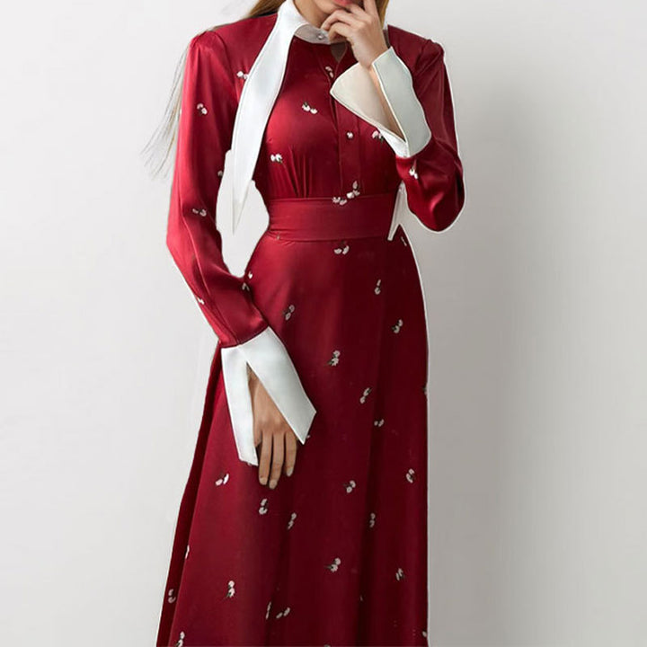 Kvinders elegante maxikjole med kunstnerisk drapering og lange ærmer Stilla