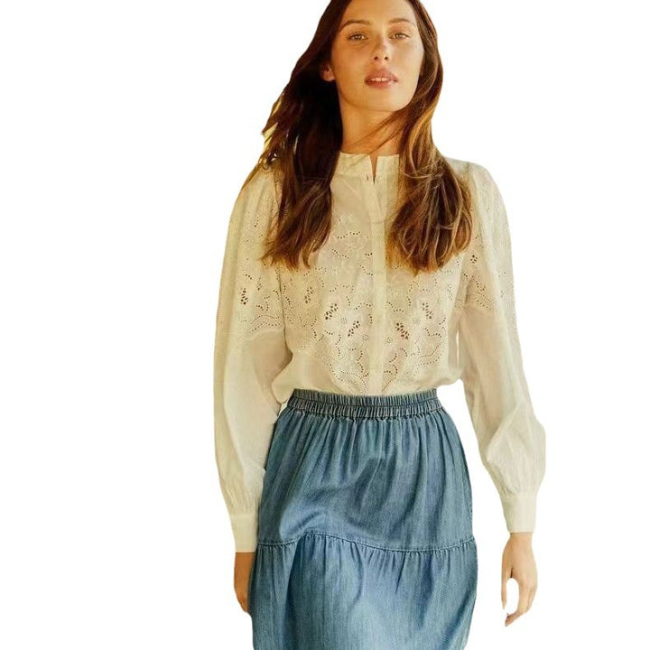 Damebluse med detaljeret hulbroderi og elegante puffærmer Stilla